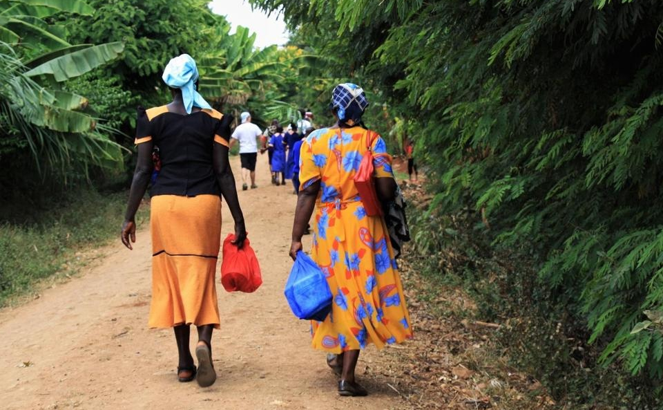 Women walking a African road